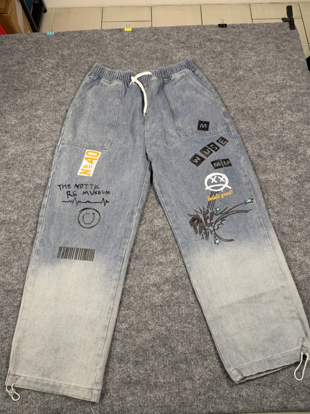 SHEIN Light Blue Relaxed Graphic Jogger Jeans